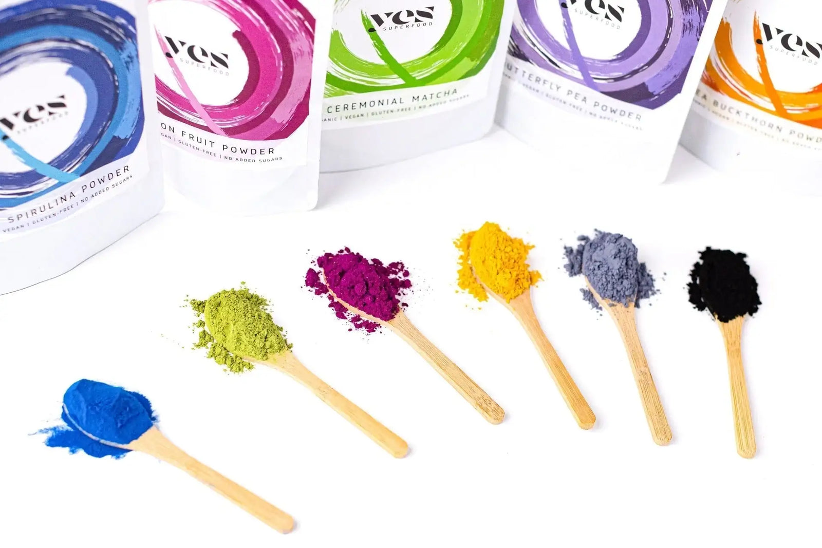 The Most Efficient Ways to Use Yes Superfood Powders Colorful Yes Superfood powders in small bowls — Blue Spirulina, Dragon Fruit, Butterfly Pea, and Matcha