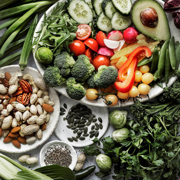 Selection of fresh vegetables, seeds and nutrient rich superfoods