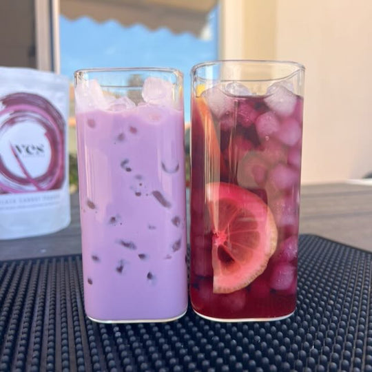 Black Carrot Powder used to create a pale purple milk drink and a burgundy citrus drink